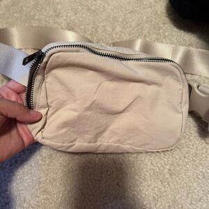 Cream belt bag